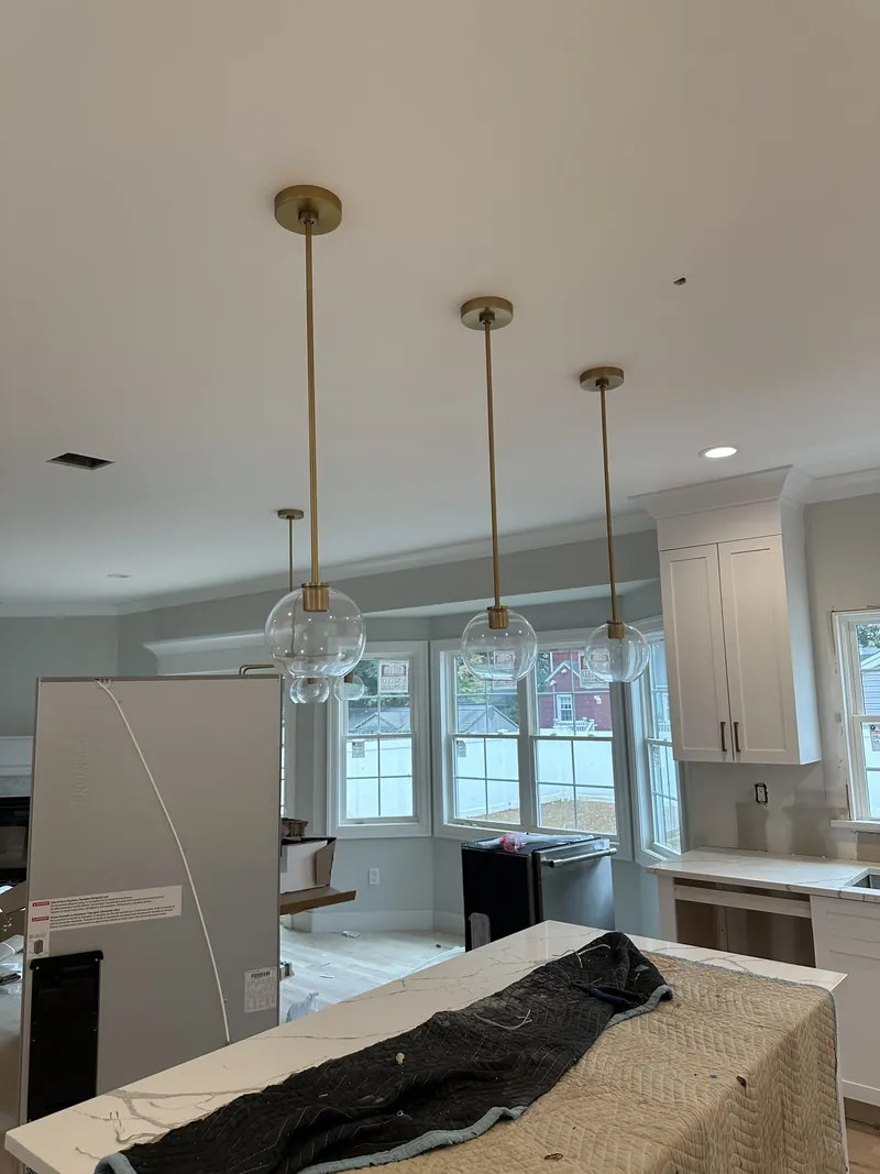 Kitchen island pendants over a new kitchen — MTL Electric, Long Island