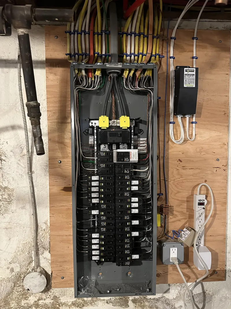 Finished panel — conductors bundled, breakers labeled — MTL Electric, Long Island